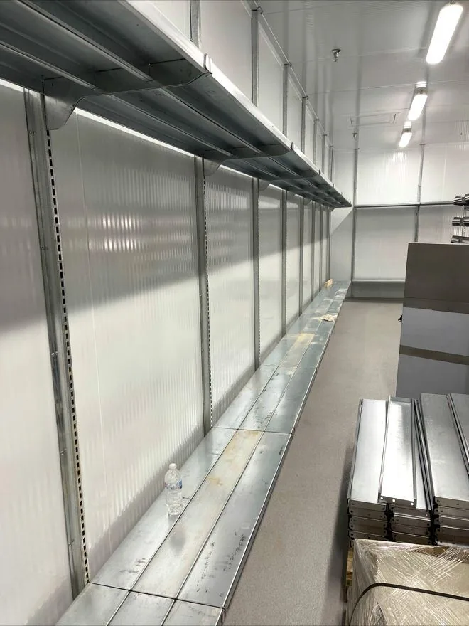 Heavy-duty shelving system inside a walk-in cooler