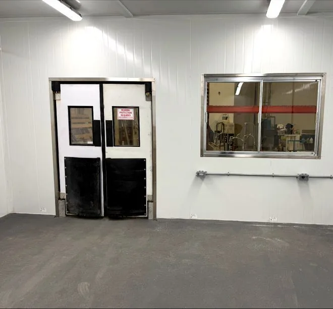 Walk-in cooler doors with vision panel